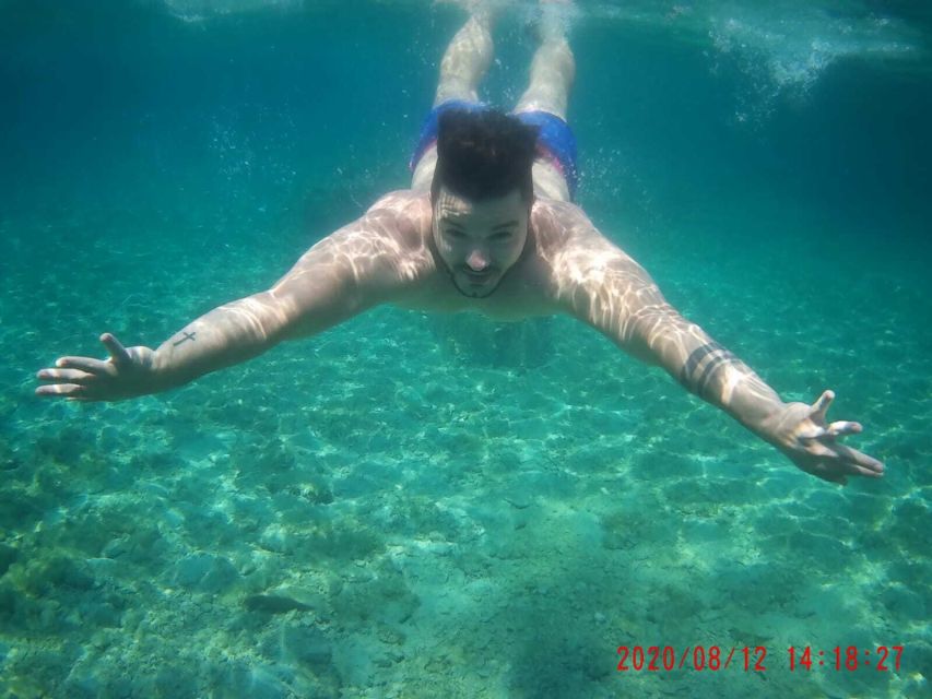 From Split: Luxury Cabin Boat Tour to The Blue Cave and Hvar - Swimming near Budikovac and the Blue Lagoon