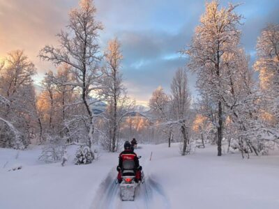 From Tromso: Eco Luxury Snowmobile Adventure to Lyngen Alps