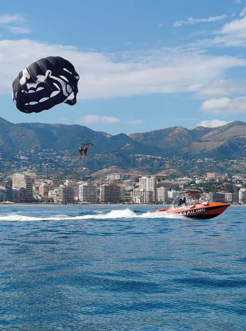 Fuengirola: Deluxe Parasailing Flight from Fuengirola Port - Going up on the 1300-foot cable