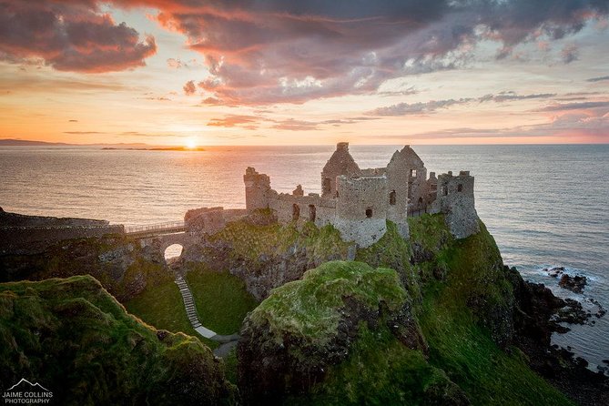Giant's Causeway Tour from Belfast - Luxury Bus + Castles Tour - Dunluce Castle adds drama to the return journey