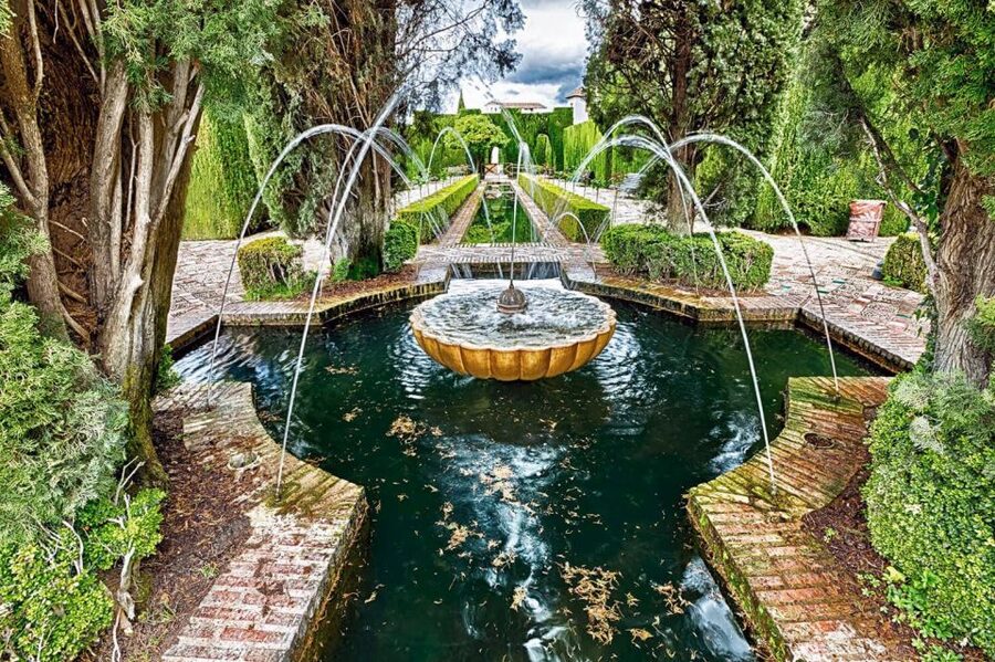 Granada: Full Alhambra Premium Guided Tour with Tickets - The fortress first: viewpoints, village life, and the Alcazaba