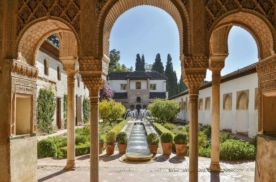 Granada: Full Alhambra Premium Guided Tour with Tickets - The Palace of Charles V and the layers of Granada’s past