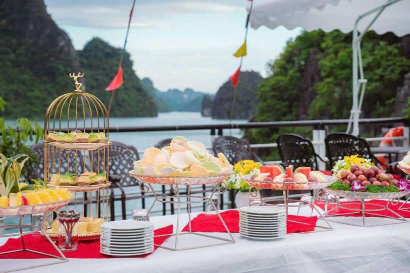 Ha Long Bay Deluxe Cruise & kayaking - 1 Day - Sunset tea, fruit, and the ride back to Tuan Chau