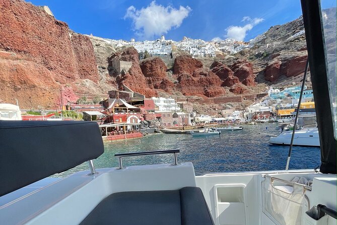 Half Day Premium Catamaran Cruise in Santorini including Oia - Oia from Ammoudi Bay and the Venetian lighthouse
