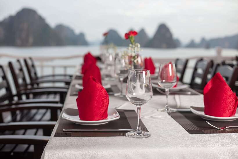 Hanoi: Ha Long Bay 2-Day 1-Night Tour by 4-star Luxury Junk - Sunset, fruit carving, and spring rolls