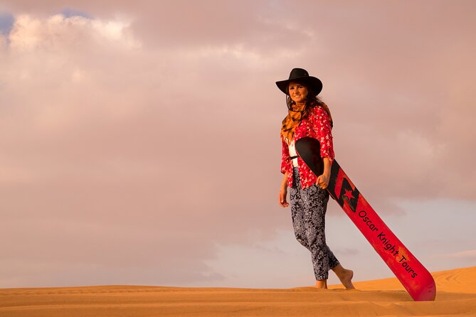 High Red Dunes with Camel Ride, Sandboarding, Falcon Show and VIP BBQ Dinner - Henna, Arabic coffee, and the camp atmosphere