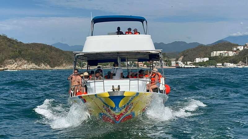 Huatulco: Premium Boat Tour with snorkel experience. - Leaving Tangolunda for Santa Cruz Pier