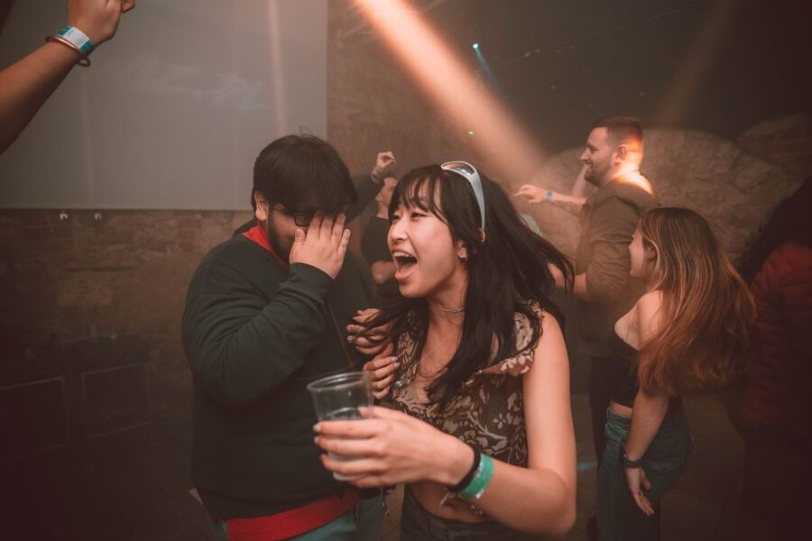 Krakow: Pub Crawl 1H Open Bar, VIP Entry & Welcome Shots - Drinking games and the professional photographer