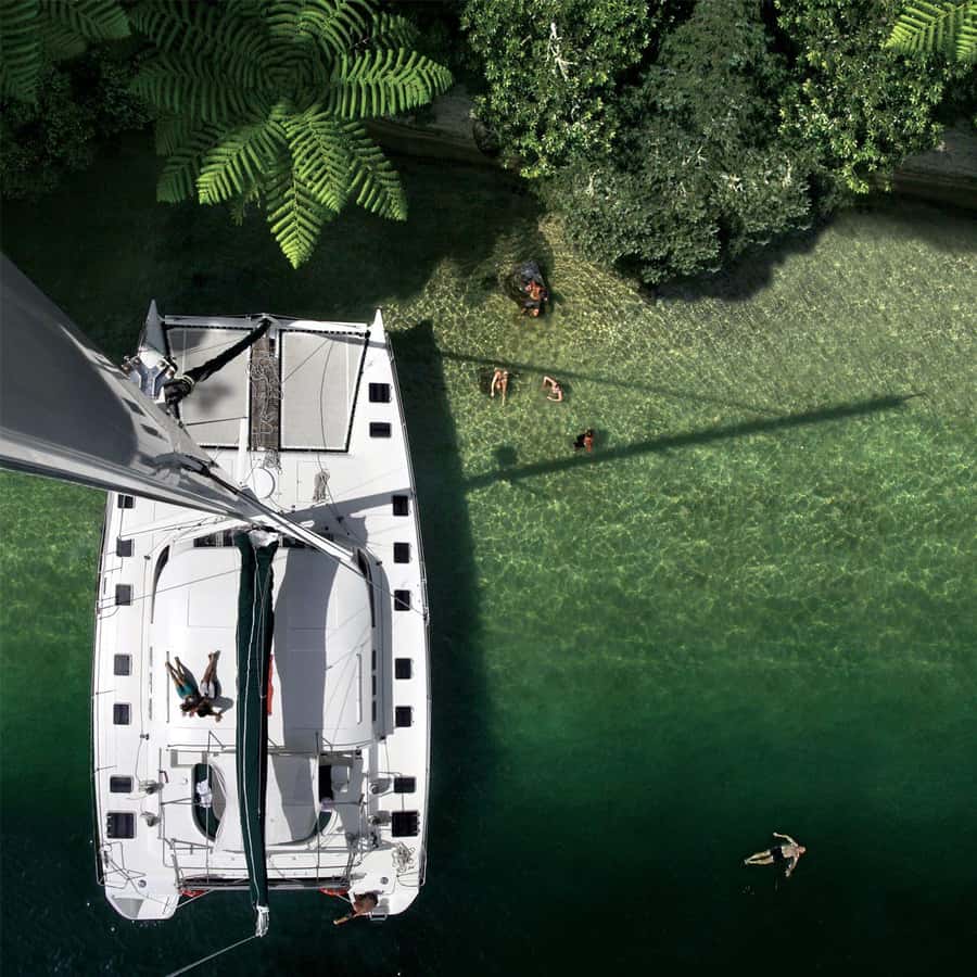 Lake Taupo: Luxury Sailing Catamaran to Māori Rock Carvings - Crossing the clear water of Lake Taupō