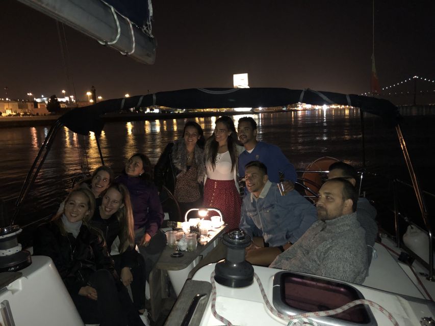 Lisbon: Luxury Sailboat Cruise at Night - Christ the King Across the River