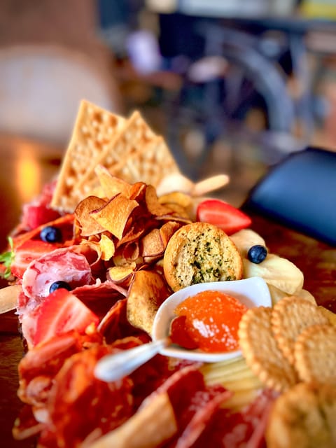 Lisbon: Premium Wine and Tapas Tasting Session - The food is a full charcuterie spread