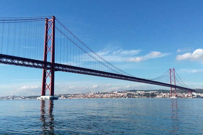 Lisbon Sailing Tour on a Luxury Sailing Yacht with 2 Drinks - Drinks, cheese, and chouriço halfway through