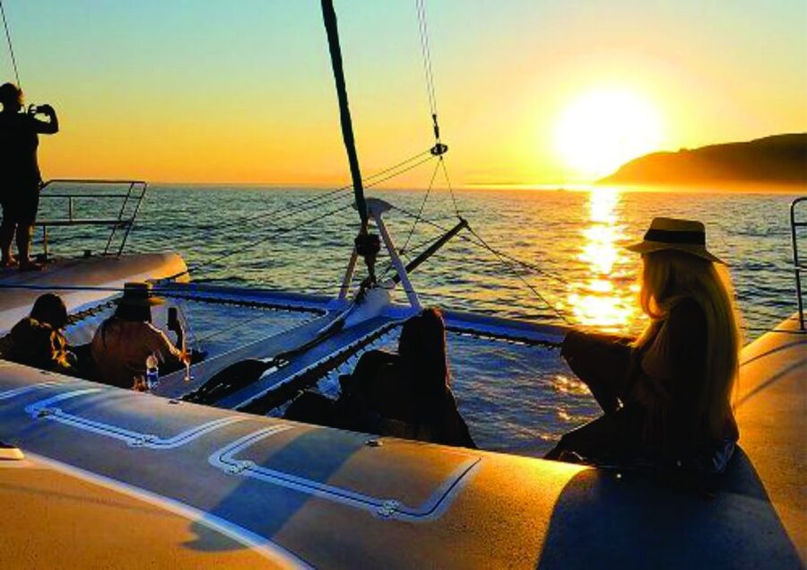 Lisbon: Sunset and Wine Luxury Catamaran Cruise - Sailing west toward Belem Tower