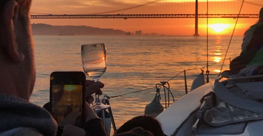 Lisbon: Sunset and Wine Luxury Catamaran Cruise - What the crew adds to the experience