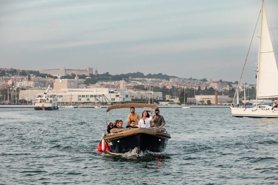 Lisbon – Sunset Porto Tonic Premium Boat Experience - Crossing beneath the 25 de Abril Bridge