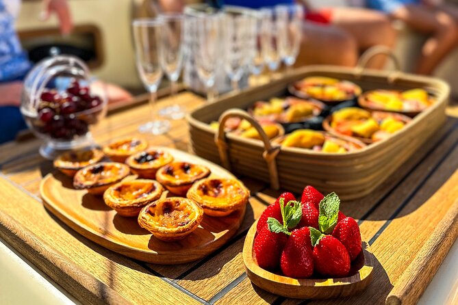 Lisbon: Vinho Verde Wine Premium Boat Experience - Drinks, snacks, and what the buffet really means