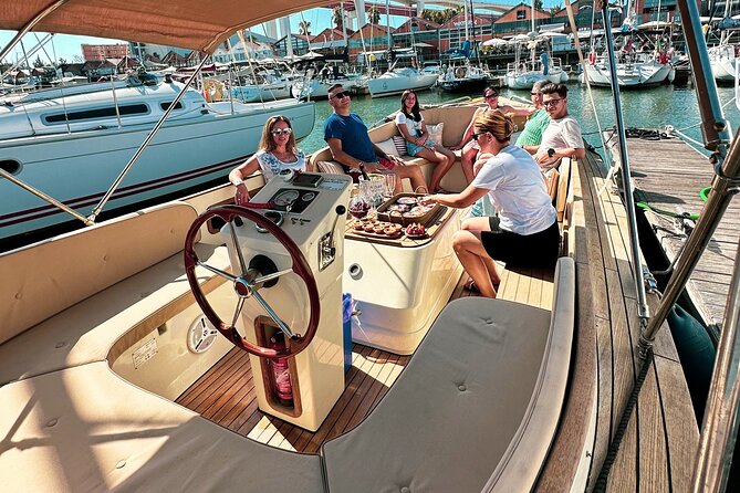 Lisbon: Vinho Verde Wine Premium Boat Experience - Rain protection and comfort on the river