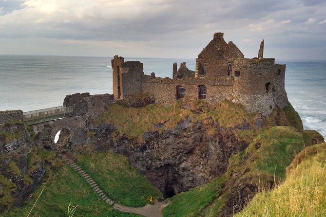 Luxury Causeway Coast Private Tour - Dunluce Castle, ruins above the water