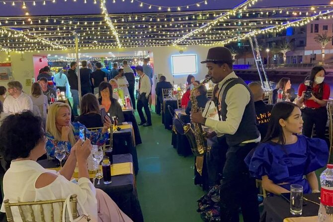 Luxury Dhow Cruise Dubai: Skyline Views & Fine Dining Experience - Live music keeps the boat from feeling quiet