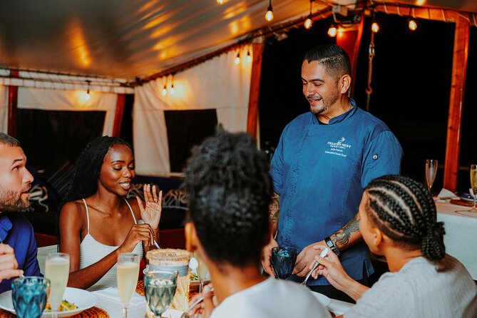 Luxury Four-Course Caribbean Dinner Cruise Experience - What the four-course dinner is like