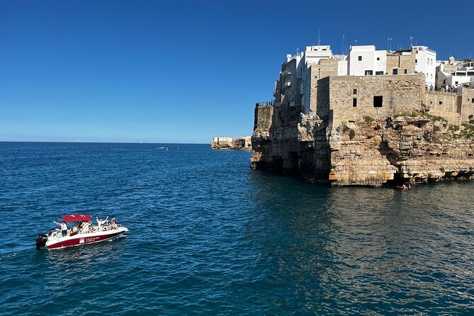 Luxury Shared Boat Tour in Polignano a Mare with Local Aperitif - The swimming stop and aperitif