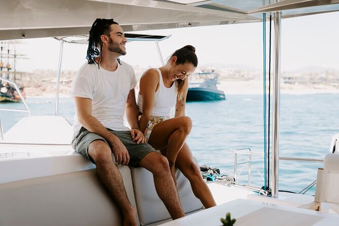 Luxury Snorkeling Tour in Cabo San Lucas - A small catamaran with a full Cabo view