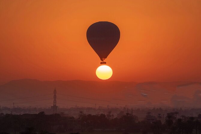 Luxury Sunrise Balloon Ride in Luxor with Hotel Pickup - The pilot, the landing, and the return