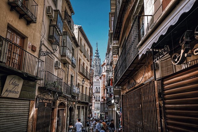 Madrid Old City Guided Exclusive Guided Walking Tour - Real Casa de Postas and the final stop at Puerta del Sol