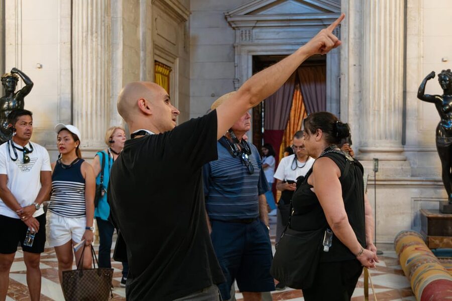 Madrid: Royal Palace VIP Tour with Skip-the-Line Ticket - Meeting at Oriente Square beneath the white umbrella