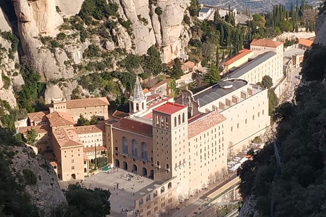 Montserrat Hiking Experience & Monastery Premium Small Group Tour - Free time for Catalan food and souvenirs