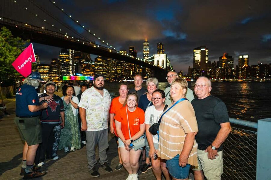 NYC at Night: 3-Hour Luxury Bus Tour of Top Highlights - Wall Street and One World Trade Center after dark