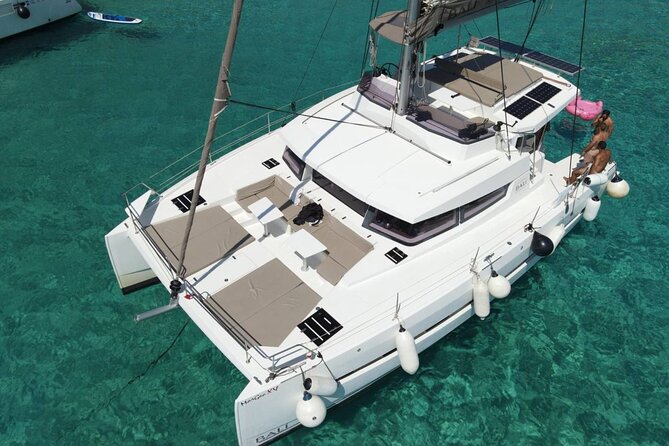 Panormo: Luxury Catamaran Cruise with Lunch & Open Bar - Afternoon Relaxation and the Sail Back