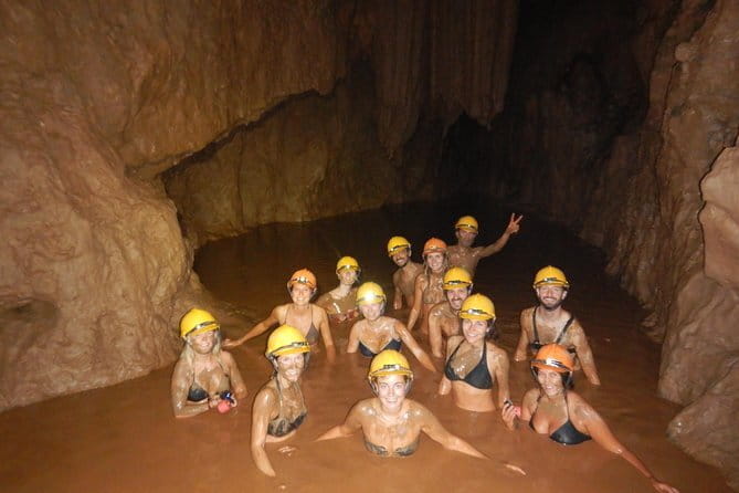 Paradise Cave & Dark Cave 1 Day - Deluxe Small Group - Dark Cave: zipline, river water, and mud
