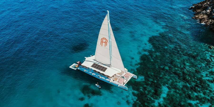 Phuket: Coral & Racha Sunset Luxury Catamaran Party Cruise - Rhapsody is a party boat first, island tour second