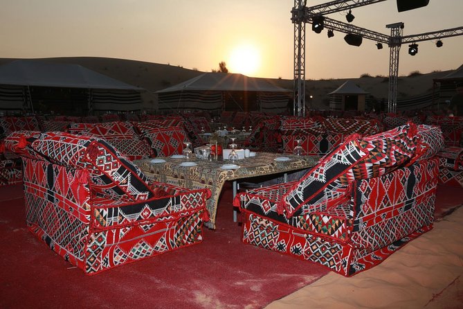 Premium 4x4 Dubai Desert Safari with BBQ Dinner - Falcon presentation, henna, and camel riding