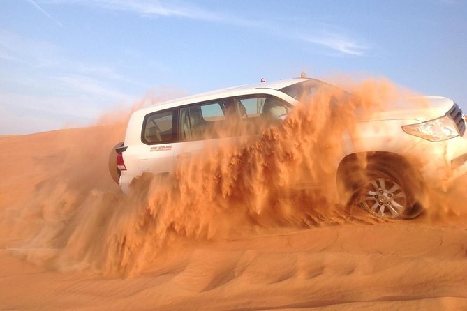 Premium 4x4 Dubai Desert Safari with BBQ Dinner - Belly dancing, fire shows, and the Ramadan change