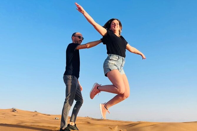 Premium Desert Safari Dubai : Dune Bashing, Camel Ride with BBQ - Belly dance, Tanoura, Khaliji dance, and fire show