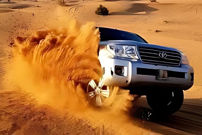 Premium Desert Safari in Dubai with Buffet Dinner - Dune bashing across the golden sand