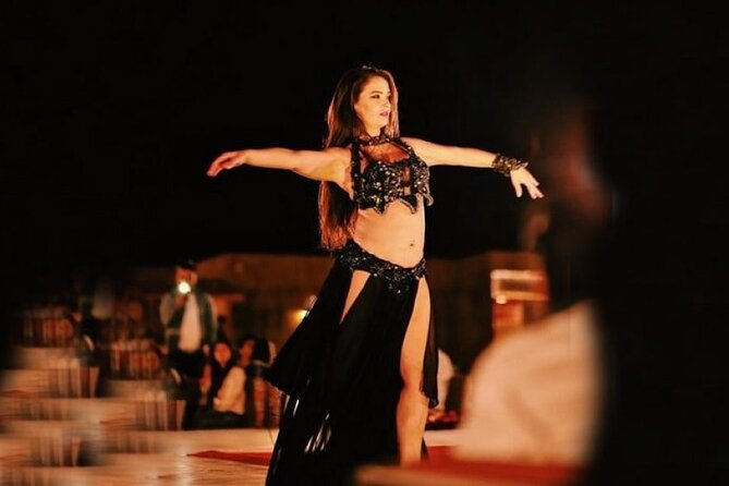 Premium Desert Safari with Dinner, Dunes and Ten Shows (VIP) - A short camel ride with a traditional feel