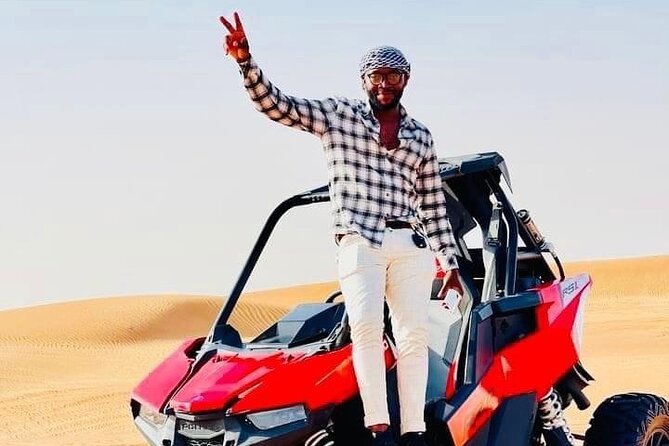 Premium Desert safari With Dune buggy camel ride BBQ dinner - Dune bashing before the camp