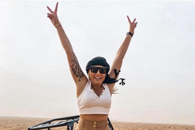 Premium Desert safari With Dune buggy camel ride BBQ dinner - Traditional shows after dark