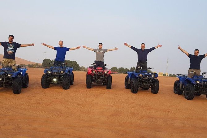 Premium Dubai Desert Safari and Quad Bike Ride - BBQ dinner, soft drinks, and three stage shows