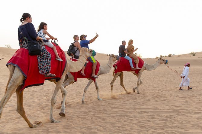 Premium Dubai Desert Safari with BBQ Dinner in the Red Dunes - Sunset, henna, and camp traditions