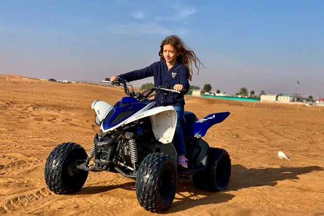 Premium Evening Desert Safari, Quad Bike, Camel & VIP BBQ Dinner - The Al Aweer camp after sunset
