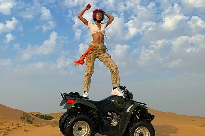 Premium Evening Desert Safari with Quad Bike, Camel Ride and BBQ Dinner - Forty-five minutes of 4x4 dune bashing