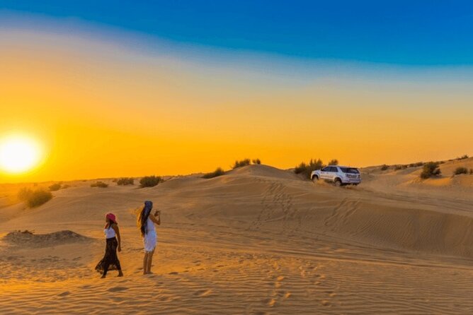 Premium Evening Dessert Safari with BBQ Dinner & Camel Ride - Sandboarding, camels, and the short activity stops