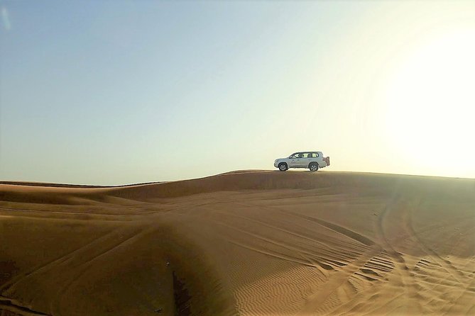 Premium Full-Day Safari, Dune Bash, Camel Ride and BBQ Meal in Desert Camp - Swimming and the beachside camp
