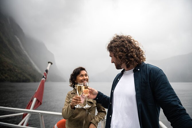 Premium Milford Sound Cruise Including Lunch - The welcome: champagne, reserved seating, and a relaxed start