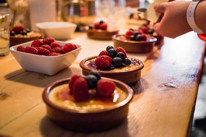 Premium Paella Cooking Class & 10 Spanish Tapas - A charming setting with one practical catch