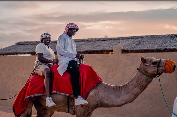 Premium Red Dune Safari with Camel Ride and BBQ in Arabian camp - Camel riding and sandboarding before camp